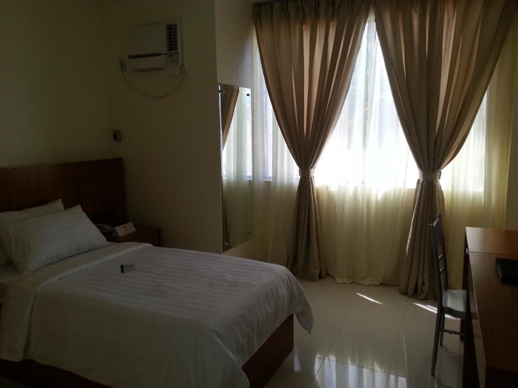 Parkway Hotel סוריגאו חדר תמונה